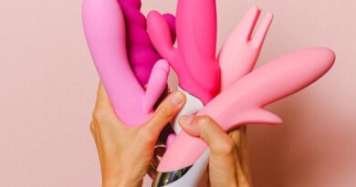 hands holding sex toys